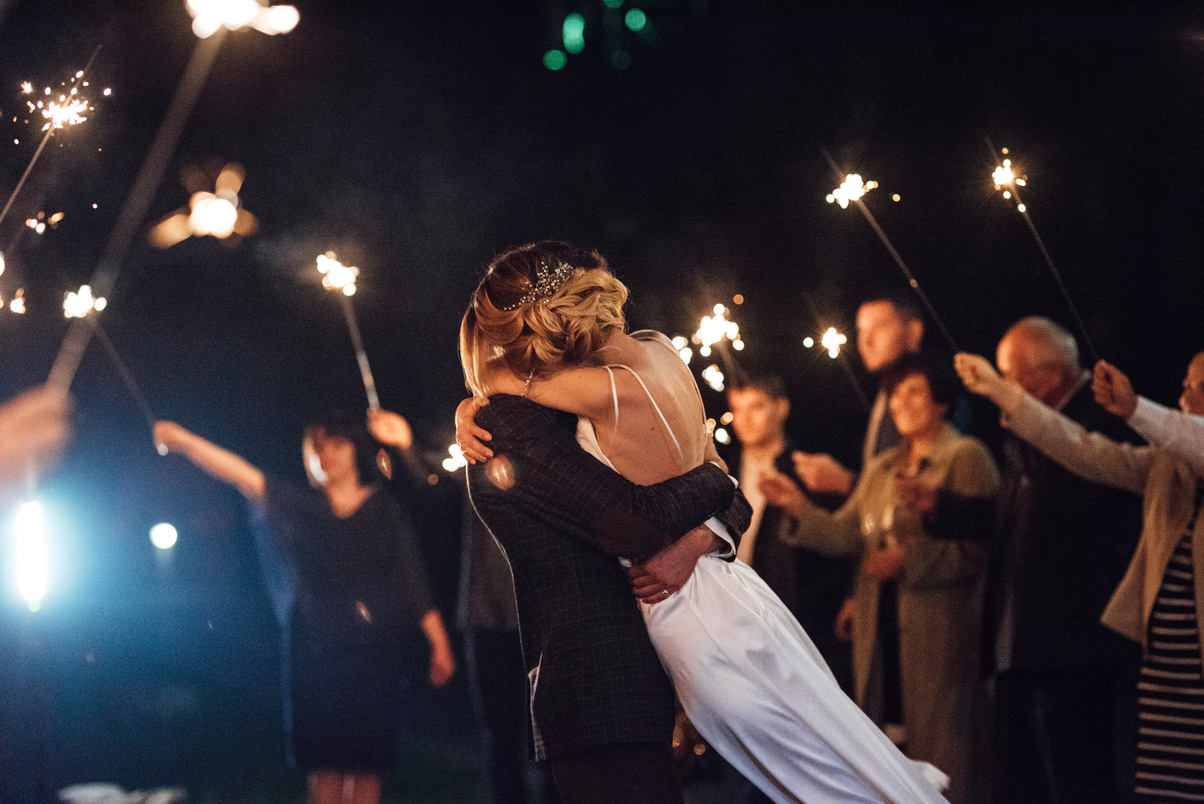 sparklers at the wedding of the newlyweds